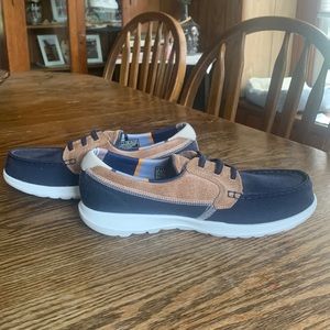 A pair of Sketchers Air cooled GOGA MAT, shoes. On the go sketchers!